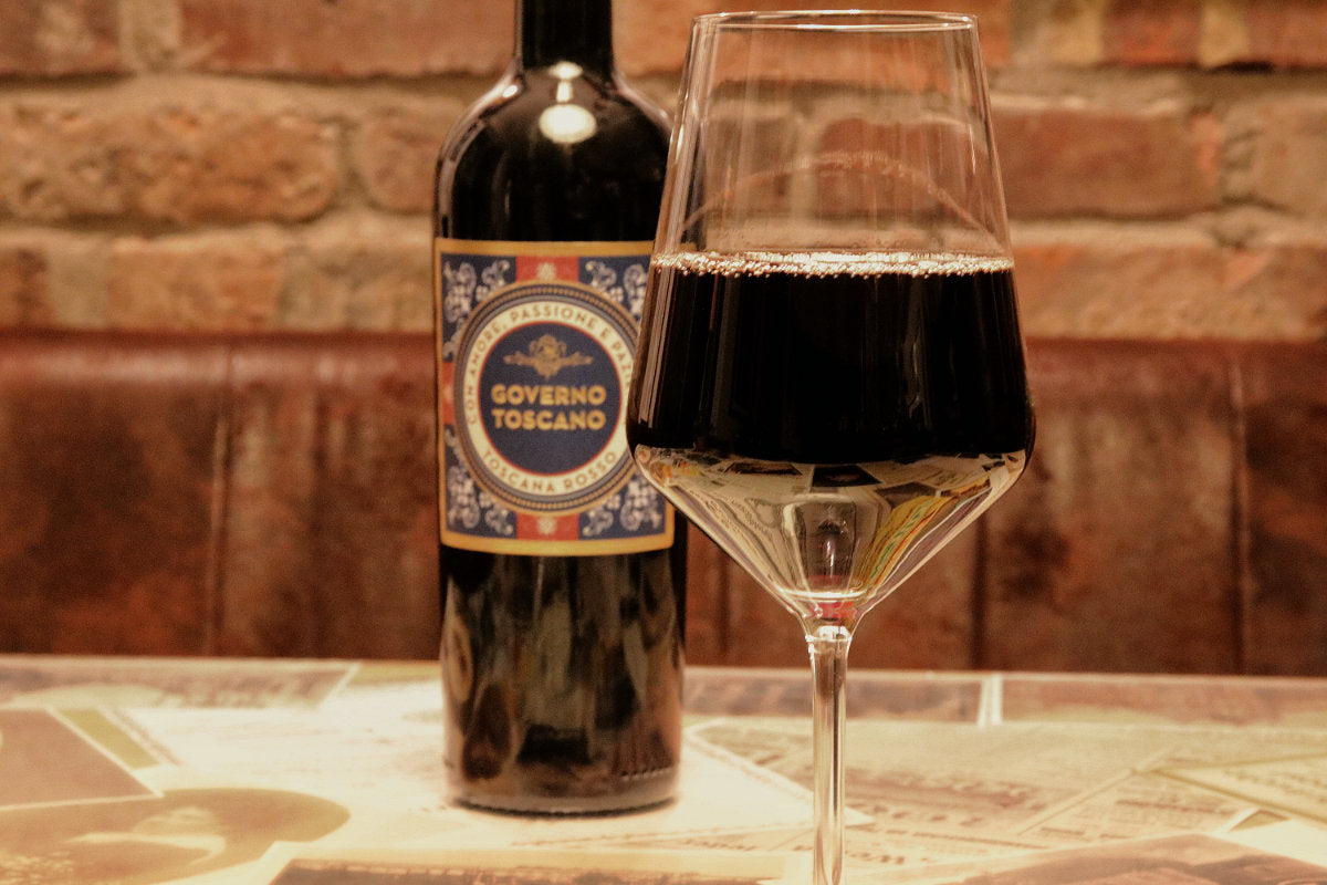 Kategoriebild Rotwein Glas Rotwein mit Flasche Rotwein